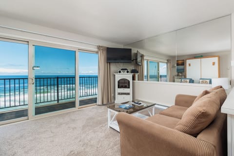 13 Oceanfront 2nd Floor | Living area | Flat-screen TV, DVD player, table tennis