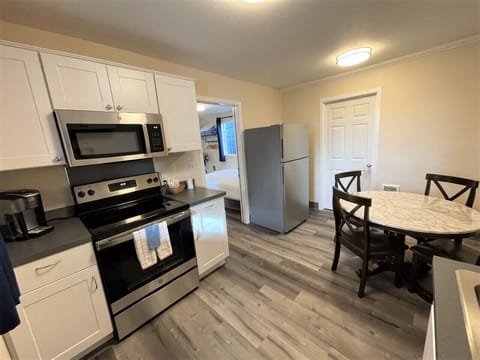 Family Suite | Private kitchen | Fridge, microwave, coffee/tea maker, toaster