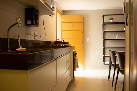 Fridge, microwave, cookware/dishes/utensils