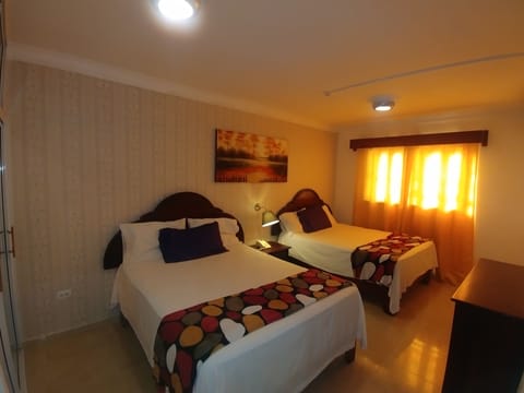 Basic Room, 2 Queen Beds | Pillowtop beds, minibar, in-room safe, free WiFi