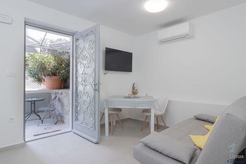 Living/dining area overlooking the small outdoor area