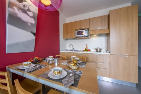 view on dining table and kitchen