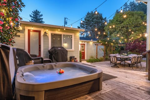This deck and patio is especially enchanting at night.