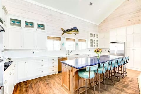Roomy kitchen with counter seating at the large island