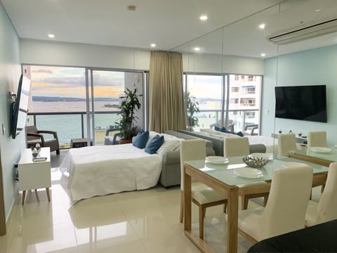 Luxury Apartment | Living area | 32-inch Smart TV with cable channels, TV