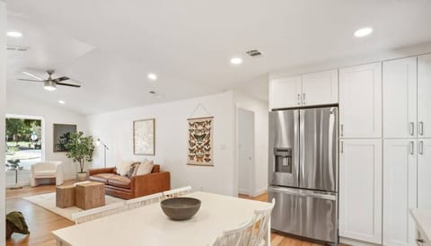 Kitchen with full refrigerator/freezer and filtered water