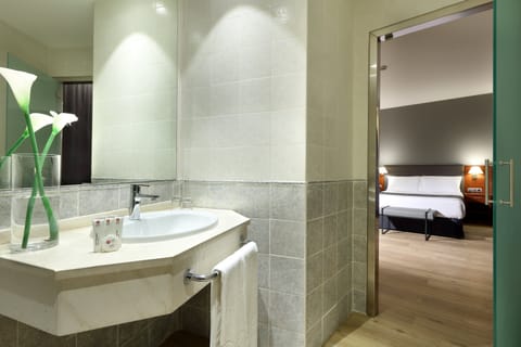 Double or Twin Room | Bathroom | Combined shower/tub, eco-friendly toiletries, hair dryer, bidet