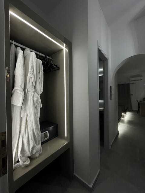 Luxury Triple Room, 1 Bedroom, Hot Tub, Pool View | Minibar, in-room safe, individually decorated, individually furnished