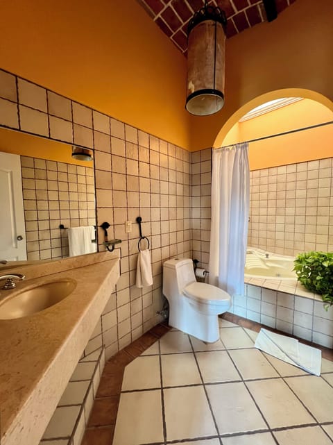 Deluxe Villa, 1 Bedroom, Hot Tub, Lagoon View | Bathroom | Shower, free toiletries, towels