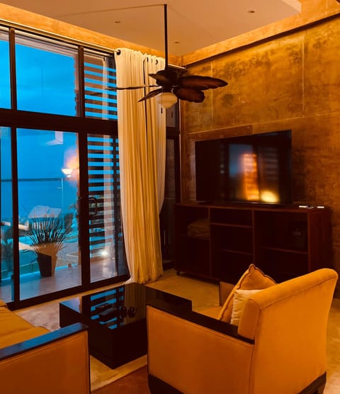 Junior Suite, Bay View | Living area | 75-inch Smart TV with digital channels, TV, Netflix
