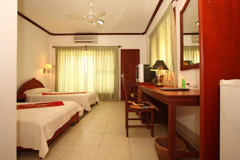 Standard Twin Room | Minibar, in-room safe, rollaway beds, free WiFi