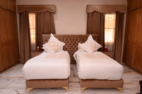 Presidential Quadruple Room, 2 Bedrooms, Garden View 109/110 | Premium bedding, down comforters, free minibar, in-room safe