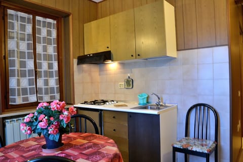 Apartment, 1 Bedroom (3 people) | Private kitchenette | Fridge, microwave, stovetop, coffee/tea maker