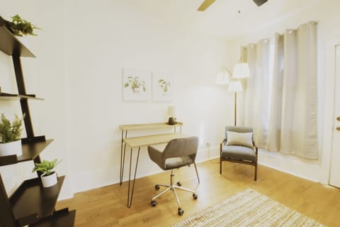 The workspace is off the kitchen