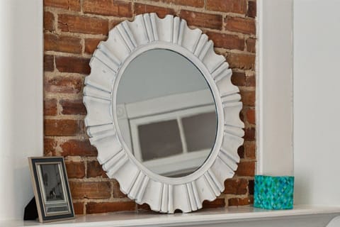 Sky Room is a second floor bedroom with queen bed, sleeper sofa, and Roku TV.