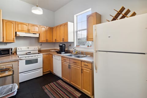 The first floor has a full kitchen outfitted with the basic essentials.