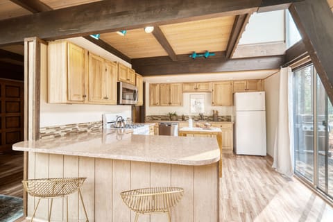 Barstool seating at the kitchen.