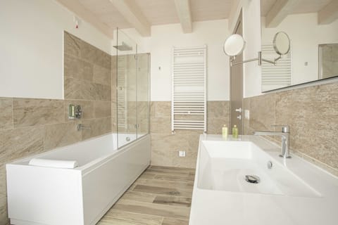 Suite | Bathroom | Hair dryer, bathrobes, bidet, towels