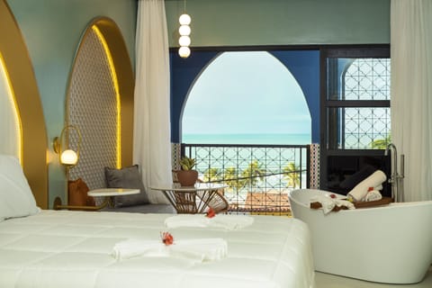 Deluxe Suite, Ocean View | Minibar, in-room safe, individually decorated, individually furnished