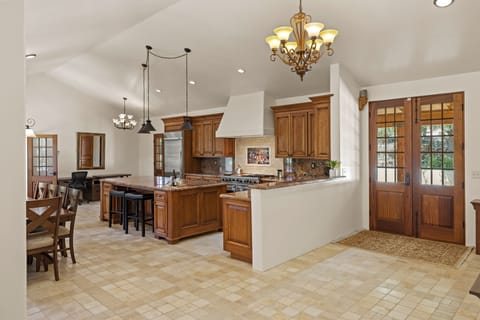 Open concept kitchen keeps you connected no matter where you are