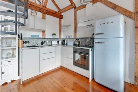 Premium Apartment, 1 Bedroom, Mezzanine | Private kitchen | Full-size fridge, oven, stovetop, dishwasher