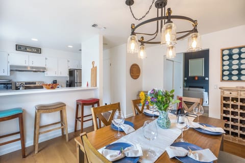 Kitchen area with counter and stools