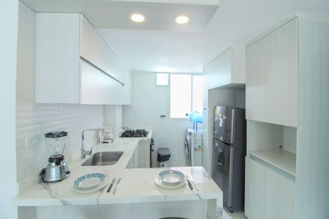 Comfort Apartment | Private kitchen | Full-size fridge, oven, stovetop, dishwasher