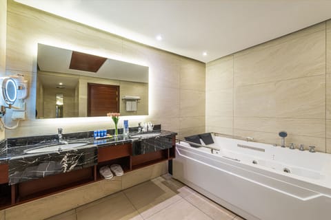 Royal Studio Suite | Bathroom | Designer toiletries, hair dryer, bathrobes, slippers