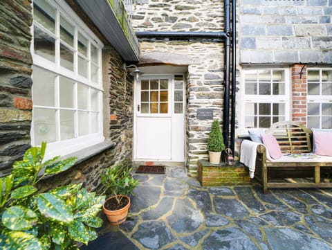 Seating in the courtyard outside the property