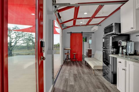 Cozy kitchen space with essentials — perfect for morning coffee or late-night snacks.