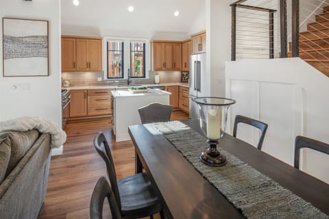 Gather round the dining table for eats and drinks or a board game