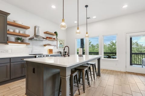 Kitchen view as you walk from the staircase.  Located on the second floor.