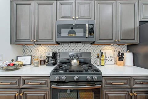 Use clean, new GE appliances to prepare meals for your group. Large appliances include microwaves, oven range, French door refrigerator, dishwasher, & garbage disposal. The upstairs kitchen has a gas oven range and the lower level has electric.