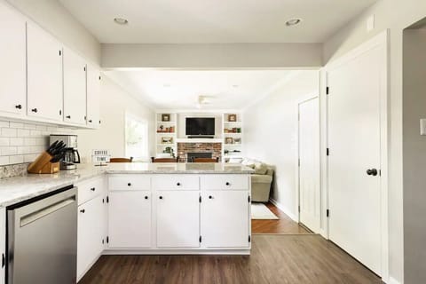 The kitchen looking into the den.