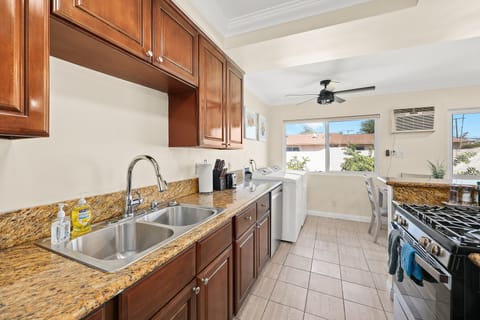 Buy fresh ingredients from the local market and cook.