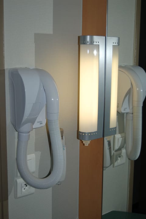 Shower, eco-friendly toiletries, hair dryer, towels