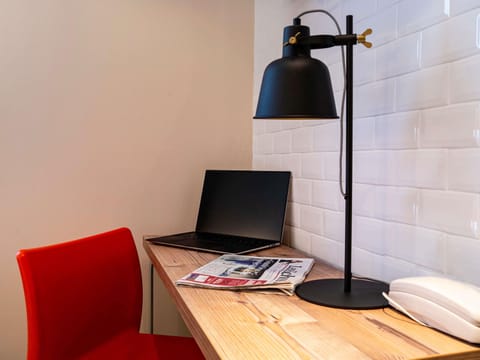 Desk, soundproofing, iron/ironing board, free cribs/infant beds