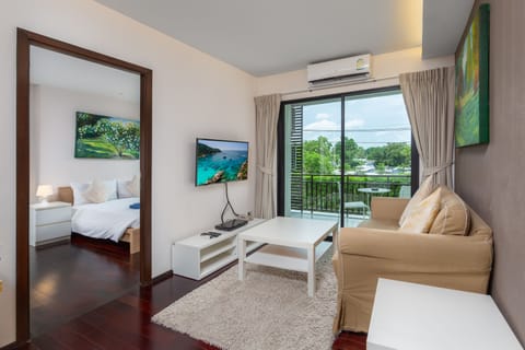 Standard Apartment | Living area | 32-inch flat-screen TV with cable channels, TV, DVD player