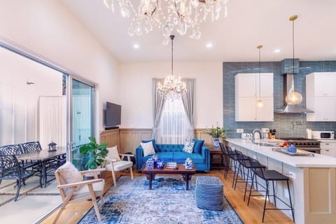 The large 1000 sq ft living space connects to the outdoor garden