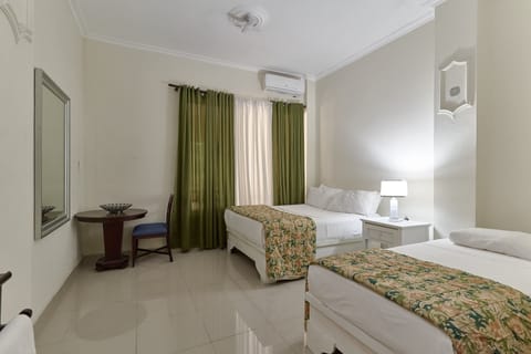 Deluxe Double Room | Desk, laptop workspace, blackout drapes, iron/ironing board
