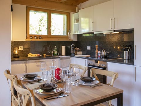 Table, Furniture, Property, Cabinetry, Tableware, Countertop, Dishware, Chair, Wood, Interior Design