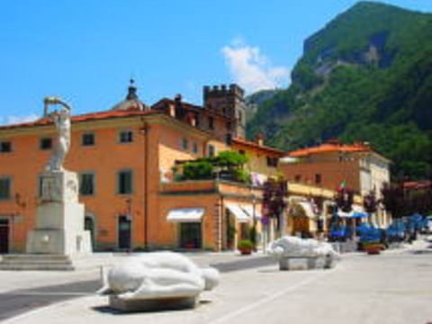 Sky, Building, Window, Cloud, Vehicle, Mountain, Plant, House, Tree