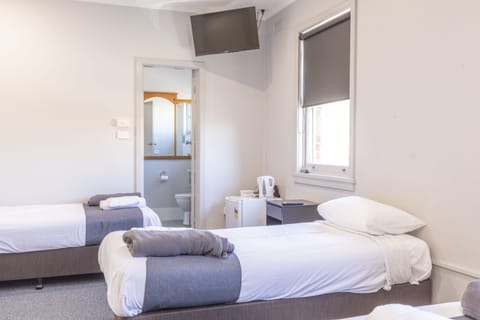 Standard Quadruple Room | Iron/ironing board, free WiFi, bed sheets