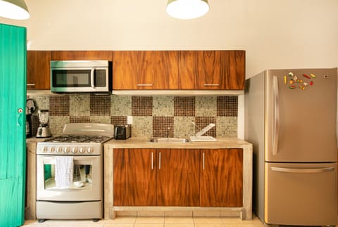 Department A: 2 bedroom king size bed | Private kitchen | Microwave, oven, coffee/tea maker, toaster