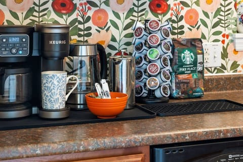 Coffee First, Plans Later – Whether you’re team drip, Keurig, French press, or tea, this cheerful coffee bar has your perfect morning covered.