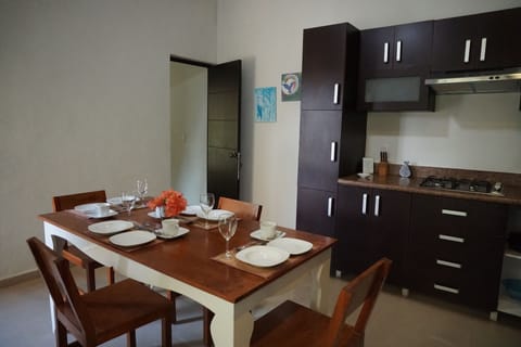 Studio Suite, 2 Bedrooms, Balcony, Pool View | Private kitchen | Fridge