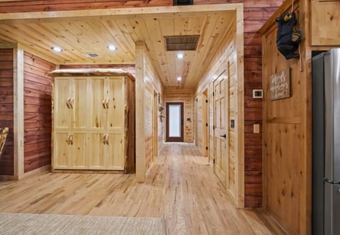 Corridor of cabin dreams! Each door opens to new memories waiting to be made.