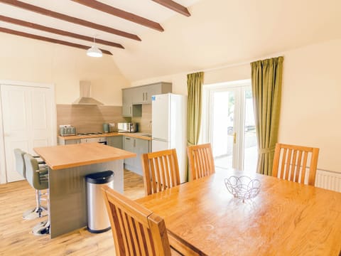 Large open plan kitchen and sitting area: large open plan kitchen and sitting area with fire | Keepers Cottage - Dalnagar Castle And Cottages, Glenshee, Cairngorms