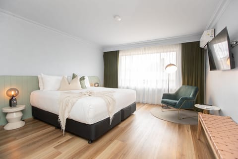 King Room | Premium bedding, minibar, blackout drapes, iron/ironing board