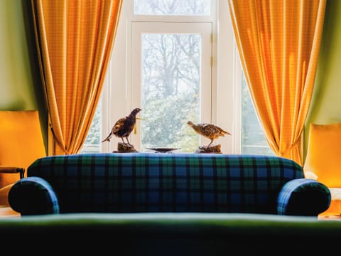 Entrance living room | Dalnaglar Castle - Dalnaglar Castle And Cottages, Glenshee, Cairngorms